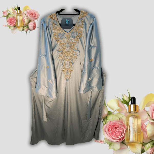 "Ethereal Elegance Dress, a luxurious garment with refined details, perfect for formal and special occasions."